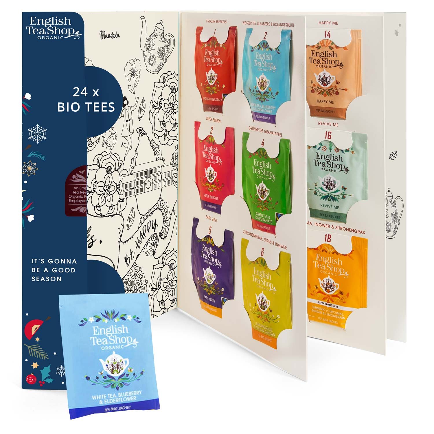Adventskalender mit 24 Bio-Teesorten. Geöffnet, zeigt Teebeutel in verschiedenen Farben. Einzelner Teebeutel liegt daneben. Mit Illustrationen.