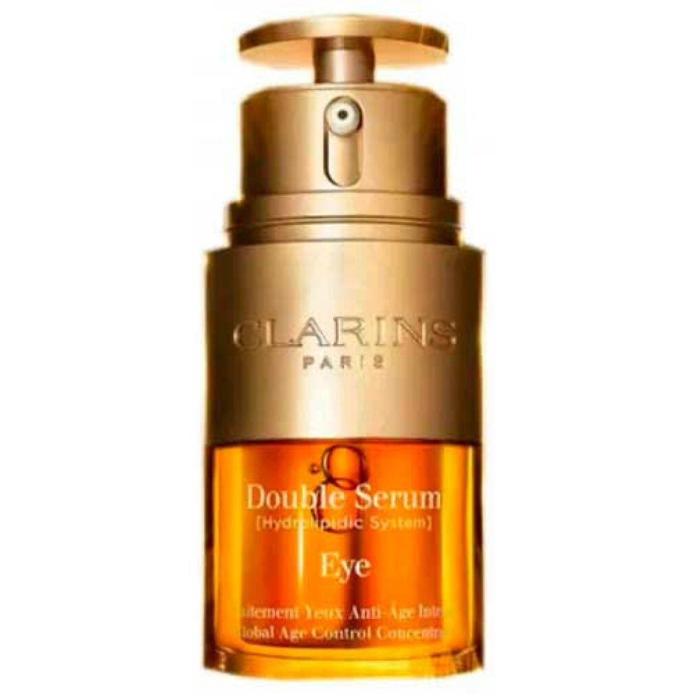 Doppeltes Serum für die Augen. Goldfarbener Behälter mit transparentem Deckel. Aufschrift: CLARINS PARIS, Double Serum Eye.