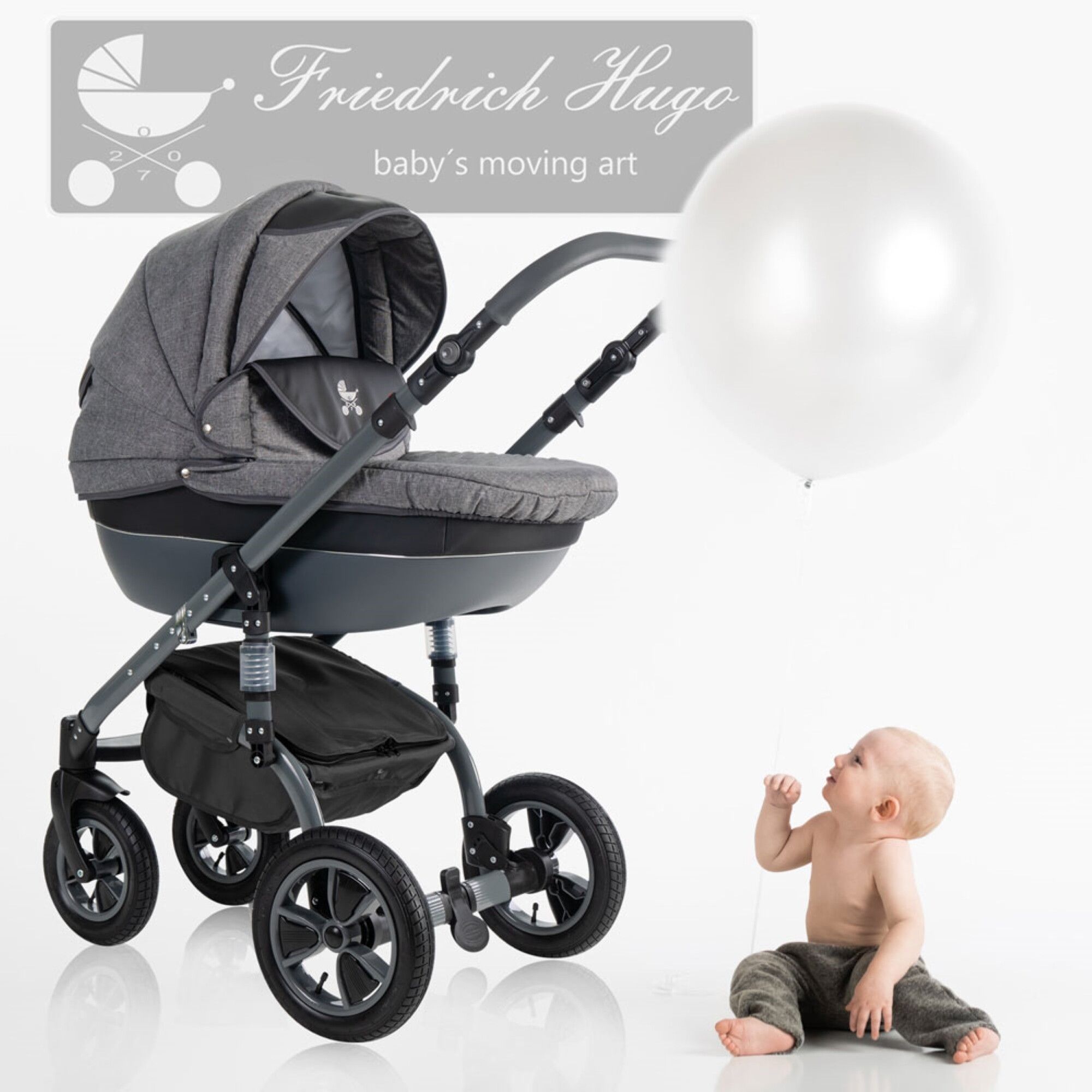 Grauer Kinderwagen mit Luftreifen. Baby sitzt neben einem Ballon. Logo: Friedrich Hugo, baby's moving art.
