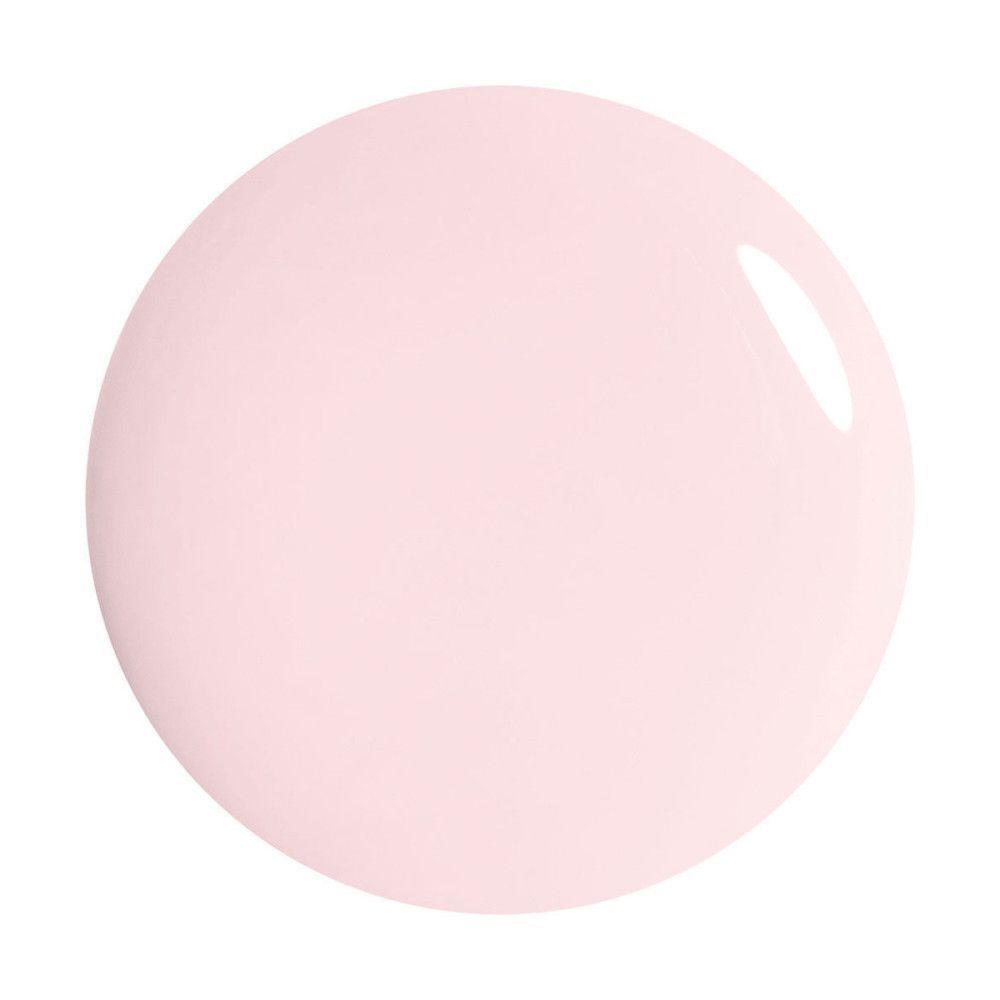 Hellrosa Nagellack-Tropfen. Runde Form, glänzende Oberfläche.