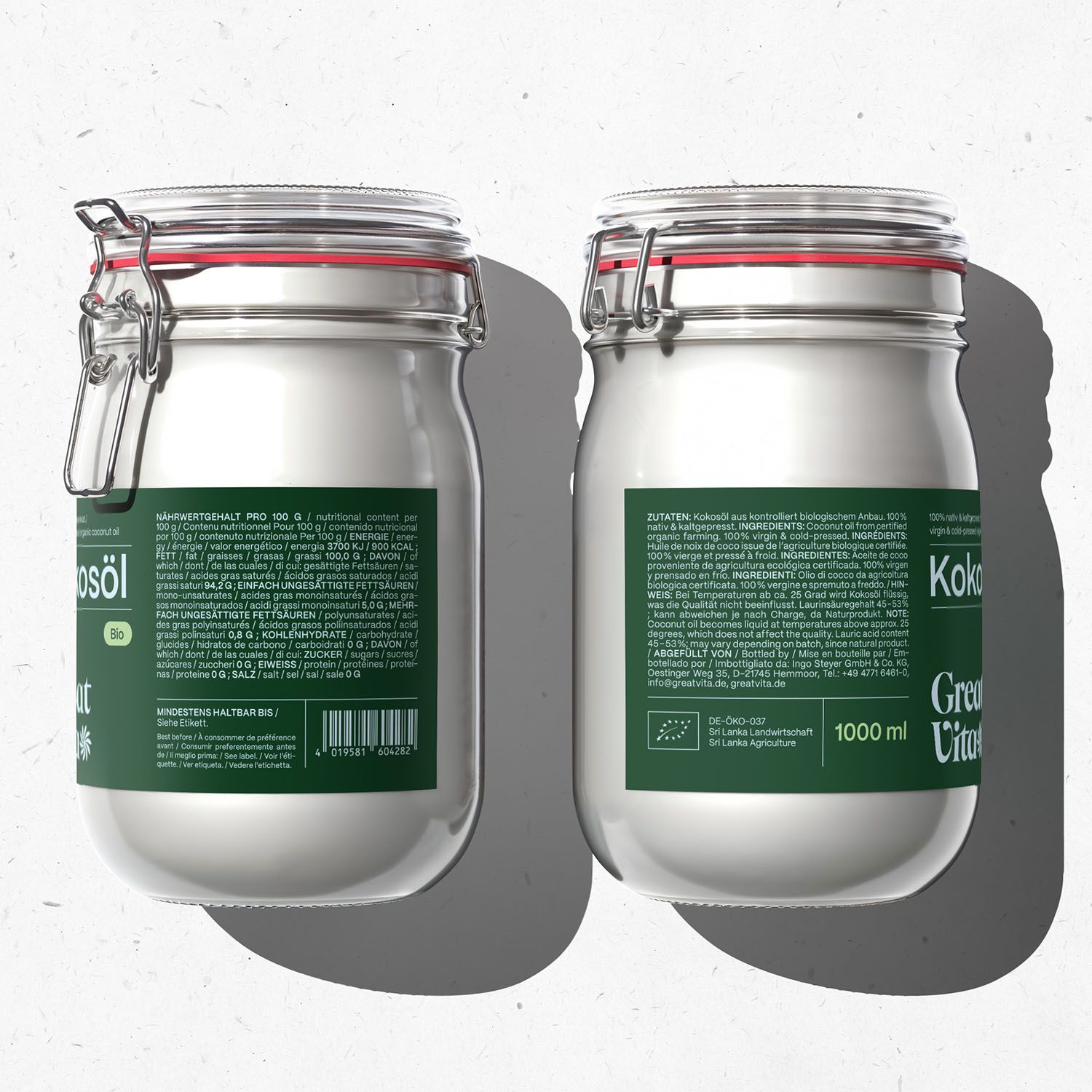 Zwei Gläser Kokosöl. Aufschrift: Kokosöl, Great Vita, Bio. 1000 ml. Deckel mit rotem Gummiverschluss. Rückseite mit Inhaltsangaben.