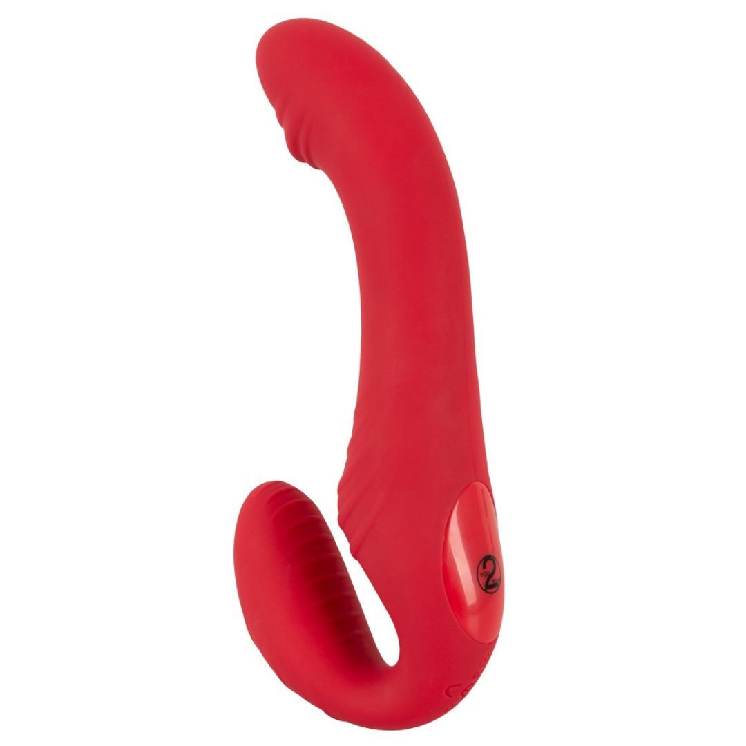 Roter, gebogener Vibrator mit abgerundeten Enden. Auf der Oberfläche ist eine Taste mit der Zahl 2 zu sehen.