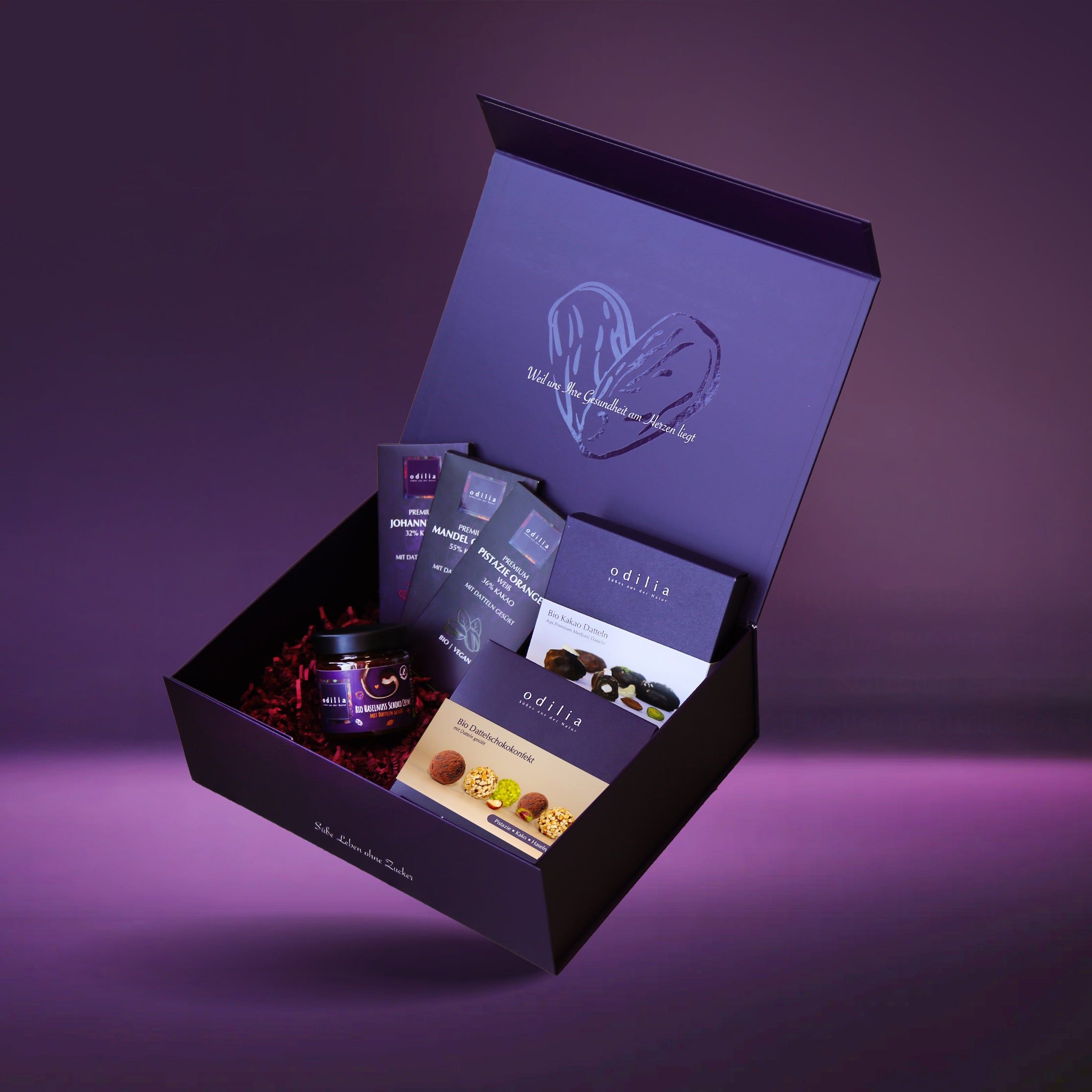 Odilia Geschenkbox mit verschiedenen Pralinen und Schokoladenriegeln.