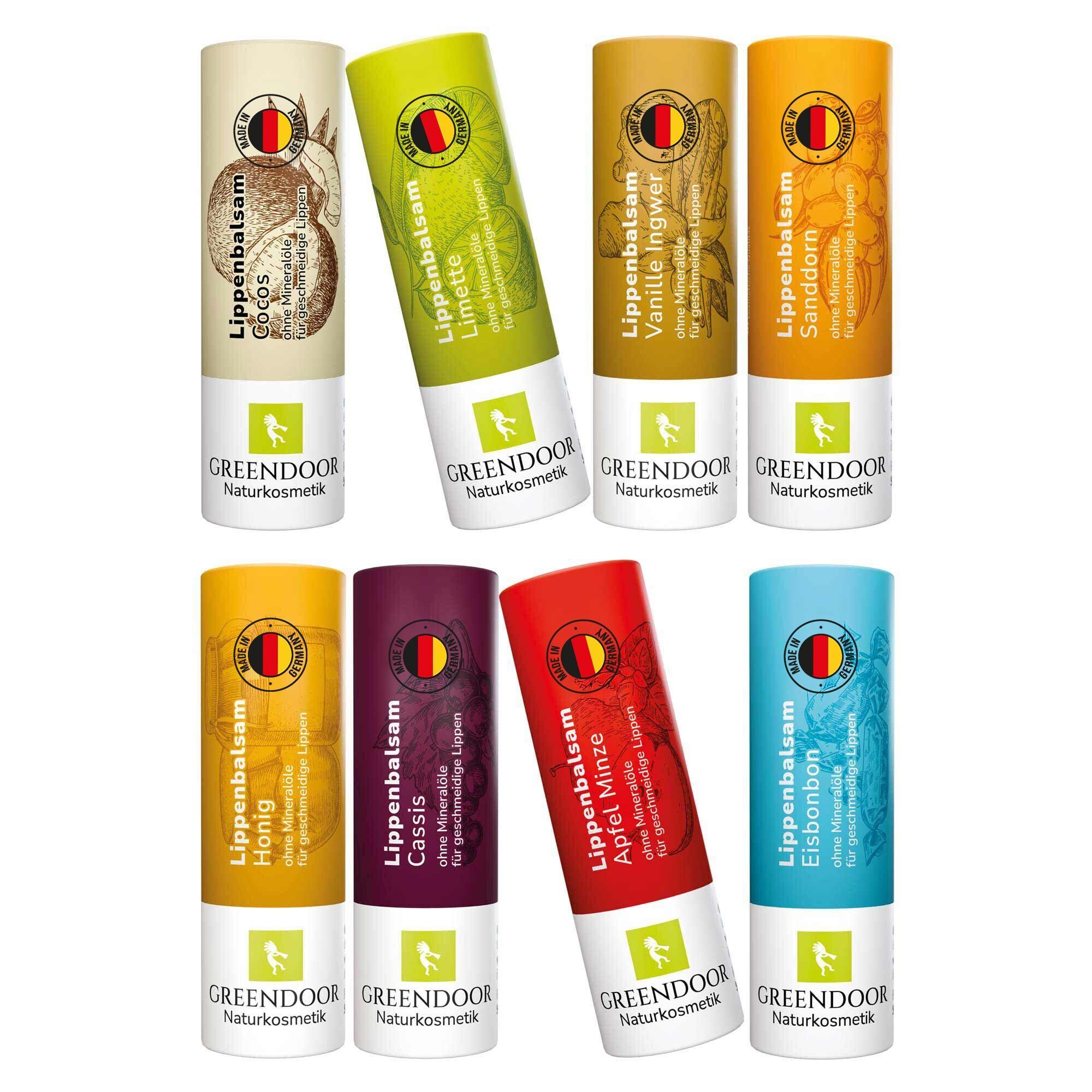 GREENDOOR Lippenbalsam Set: Acht verschiedene Sorten in Stiftform, darunter Kokos, Limette, Vanille Ingwer, Sanddorn, Honig, Cassis, Apfel Minze und Eisbonbon.
