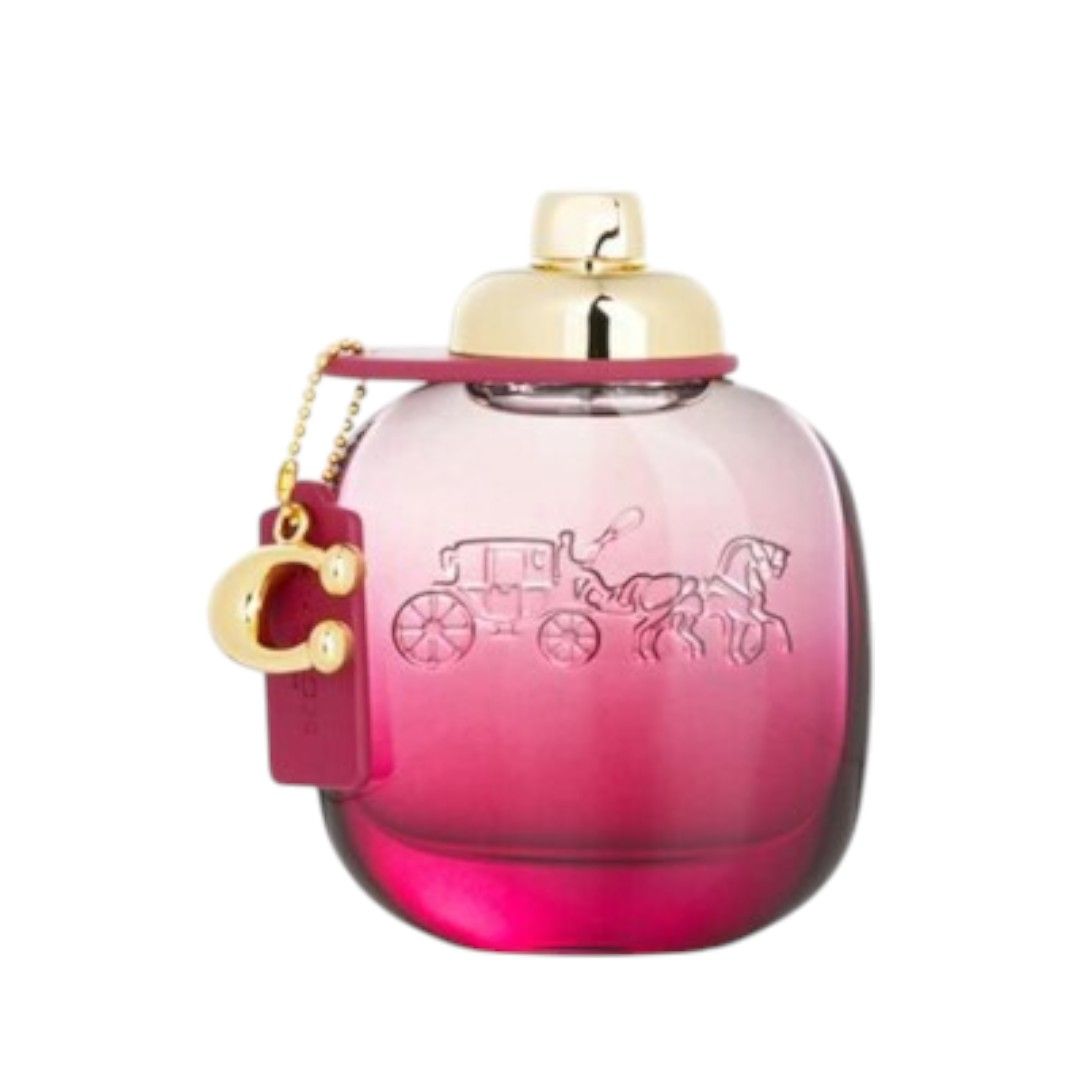 Coach Wild Rose Eau de Parfum Flakon mit goldener Kappe und Anhänger.