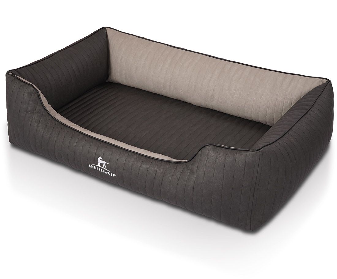 Hundebett Outback, dunkelgrau mit beigem Innenraum. Logo Knuffelwuff. Rechteckige Form mit erhöhten Seiten.