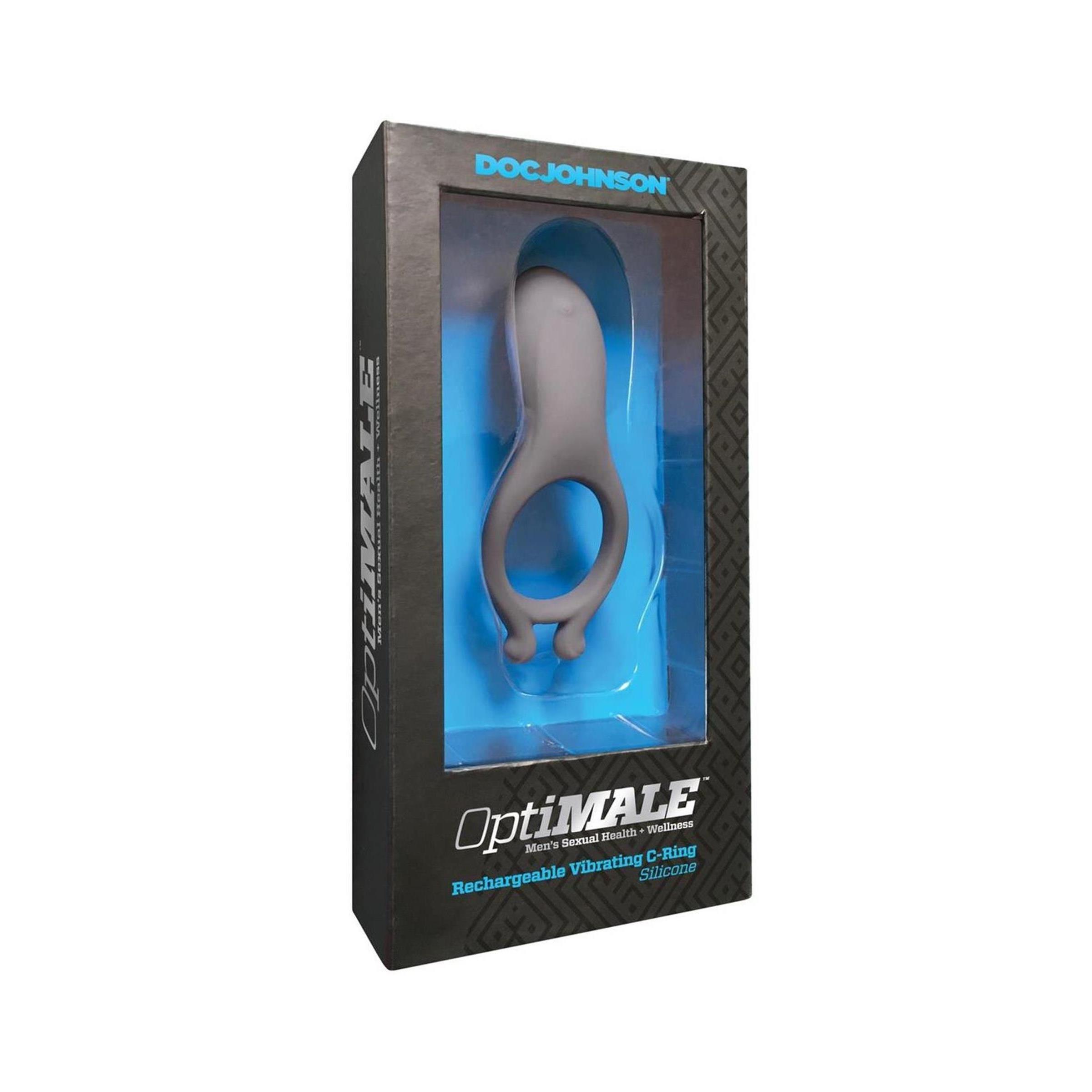 Verpackung mit Vibrations-Cockring. Marke: Doc Johnson. Produktname: Optimale. Schwarze Verpackung mit Produkt in Grau. Sichtfenster.