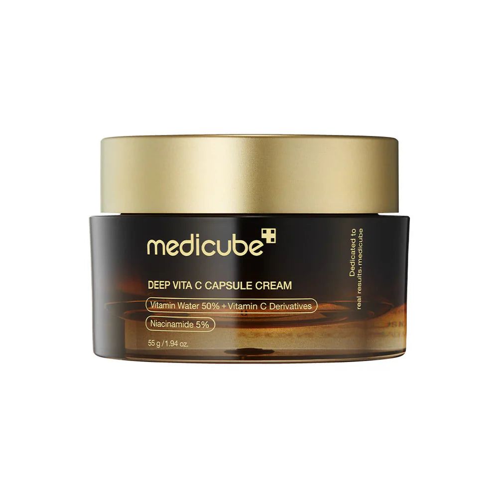 Medicube Deep Vita C Capsule Cream in braunem Glas mit goldenem Deckel.