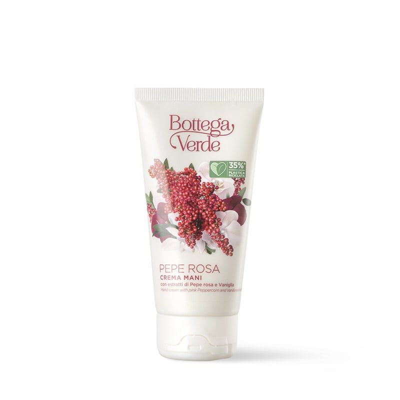 Tubo di crema mani Bottega Verde Pepe Rosa. Il tubo bianco mostra un'illustrazione di bacche di pepe rosa e fiori. Il marchio e il nome del prodotto sono ben visibili. Il prodotto contiene il 35% di ingredienti di origine naturale.