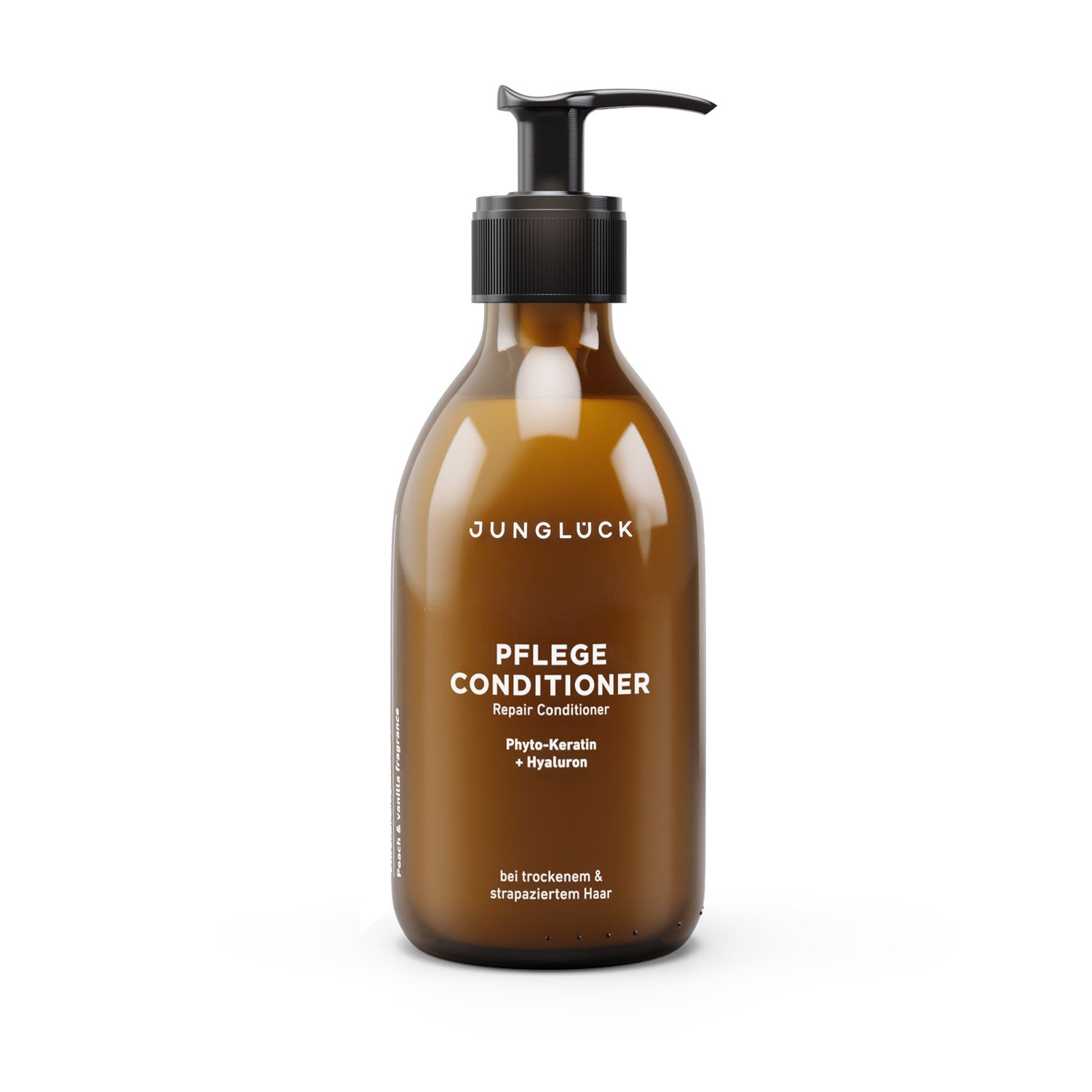 Braune Flasche mit schwarzem Pumpkopf. Aufschrift: JUNGLÜCK, PFLEGE CONDITIONER, Repair Conditioner.