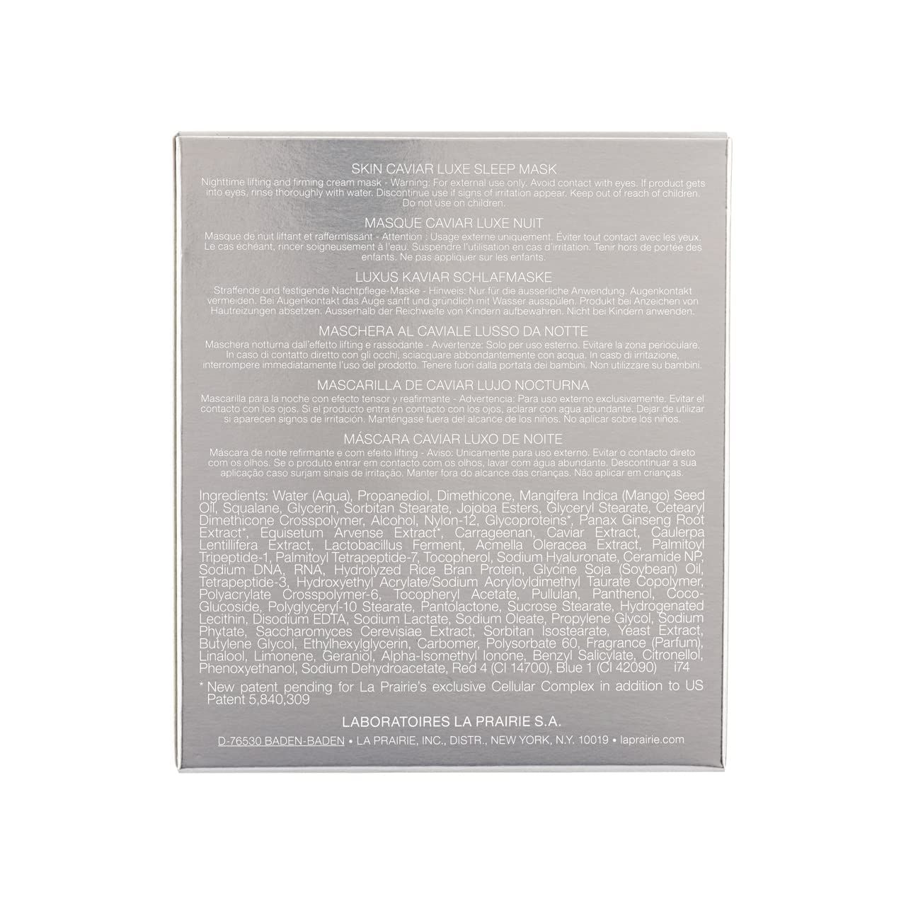 Silberne Schachtel mit Produktinformationen. Text in mehreren Sprachen. Marke: La Prairie. Inhaltsstoffe und Details.