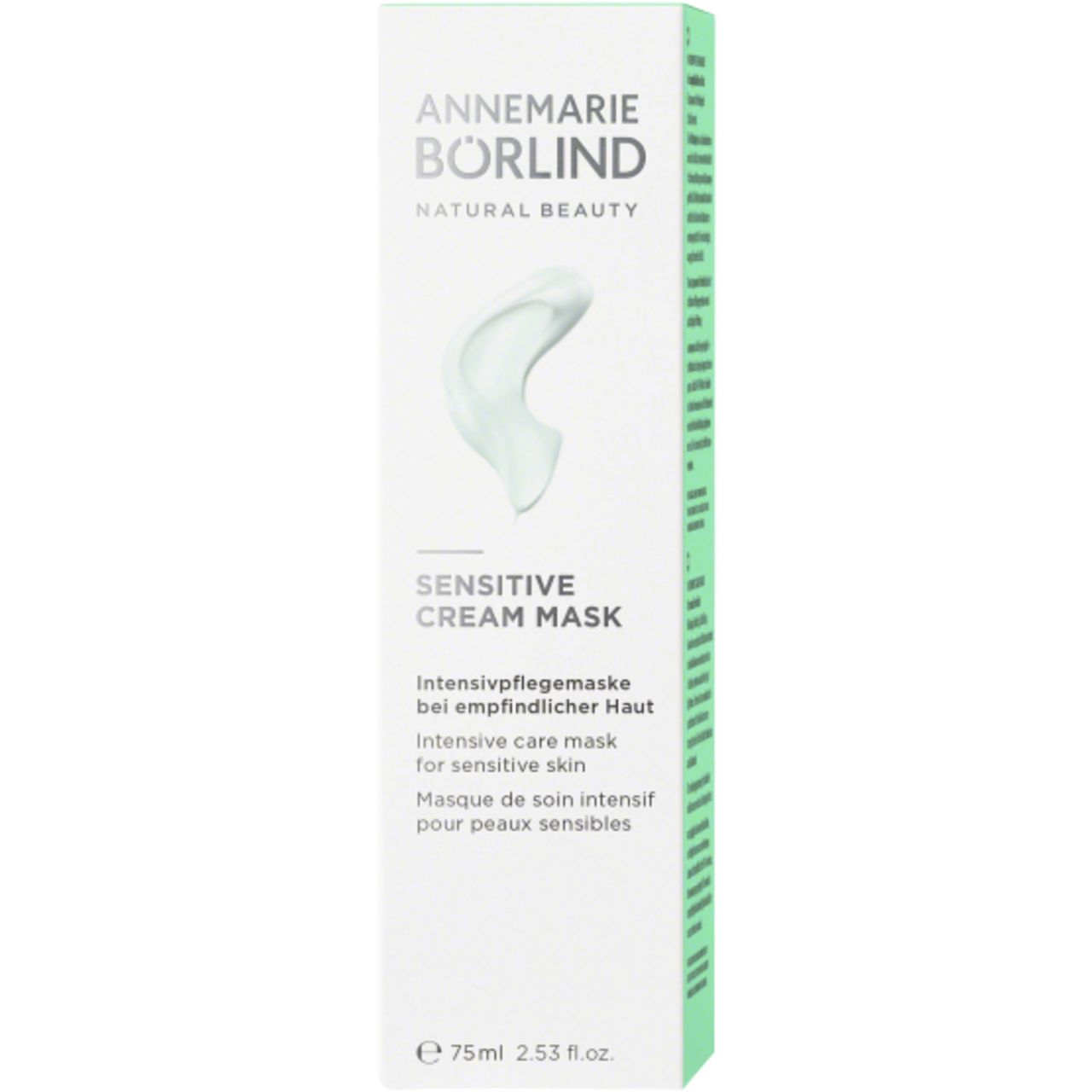 Grüne Tube mit silbernem Deckel. Aufschrift: ANNEMARIE BÖRLIND, SENSITIVE CREAM MASK. Text in Deutsch, Englisch und Französisch.