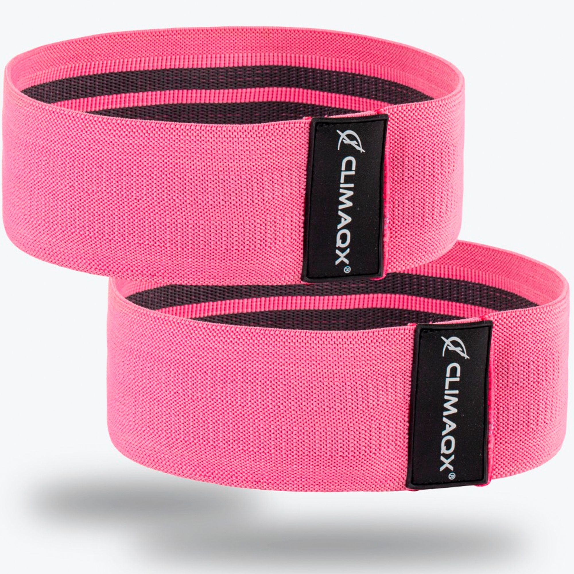 Zwei pinkfarbene Widerstandsbänder. Schwarzes Label mit "CLIMAAX"-Logo. Textilmaterial.