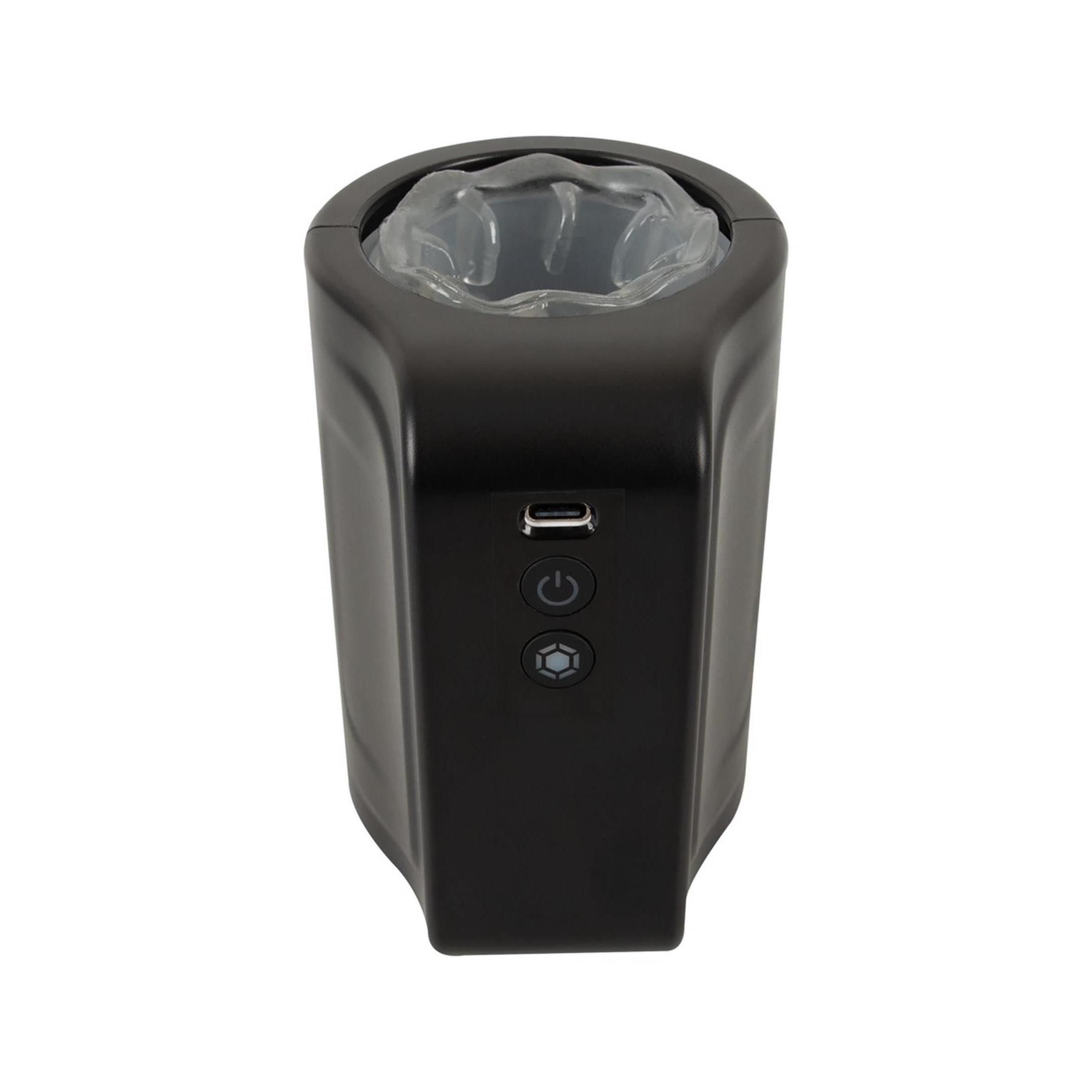 Schwarzes, zylindrisches Gerät mit USB-Anschluss und Bedienelementen. Innen transparentes Material sichtbar.
