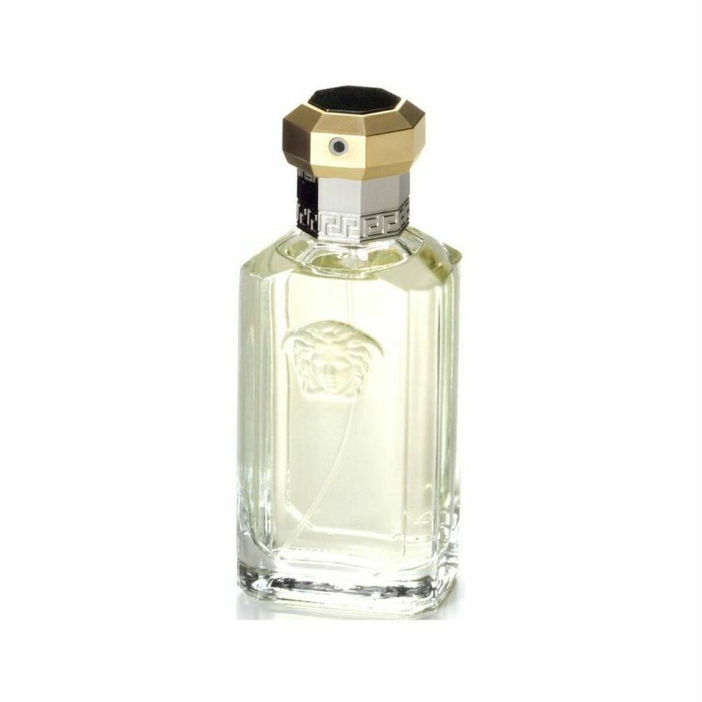 Versace The Dreamer Eau de Toilette Spray. Rechteckiger Flakon mit goldfarbenem Deckel und geprägtem Logo auf der Vorderseite.