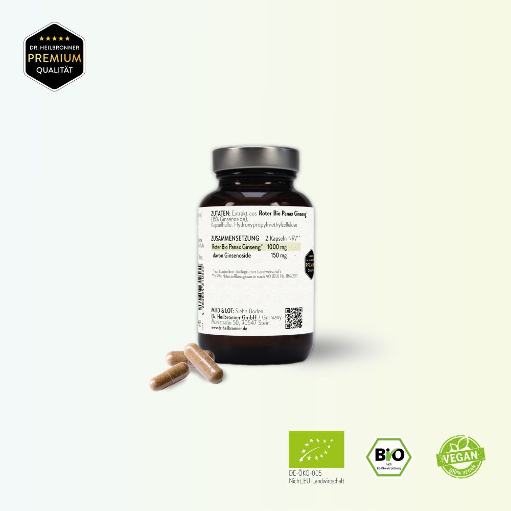 Braune Glasflasche mit weißem Etikett und Kapseln daneben. Aufschrift: Bio Ginseng, 15% Ginsenoside, PANAX, 60 Kapseln. Vegan.