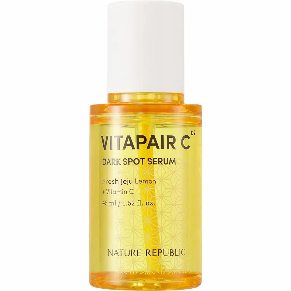 Gelbliche Serumflasche mit weißem Deckel. Beschriftung: VITAPAIR C, Dark Spot Serum, NATURE REPUBLIC.