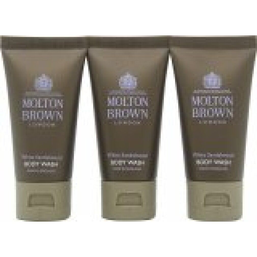 Drei Tuben Molton Brown Body Wash. Braune Tuben mit Logo und Schriftzug. Beige Kappe.