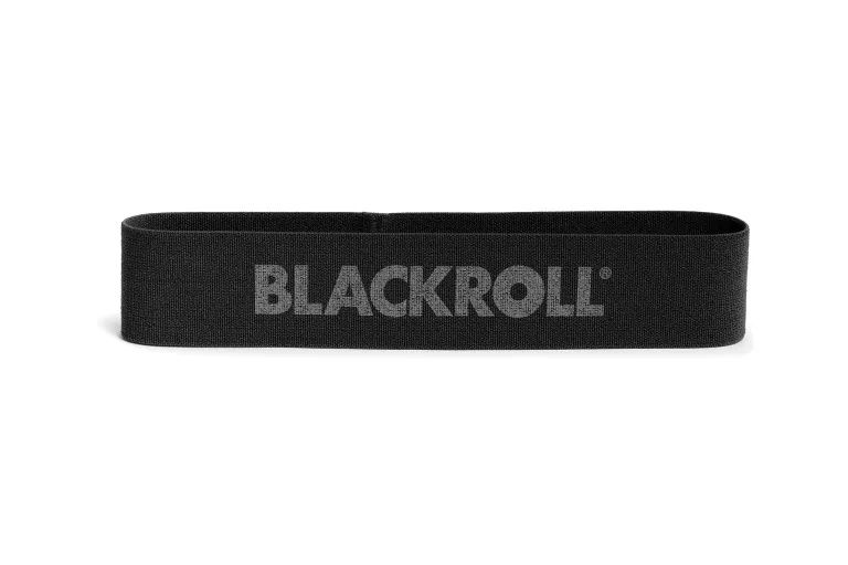 Schwarzes BLACKROLL Loop Band. Der Produktname ist in Grau aufgedruckt. Rechteckige Form.