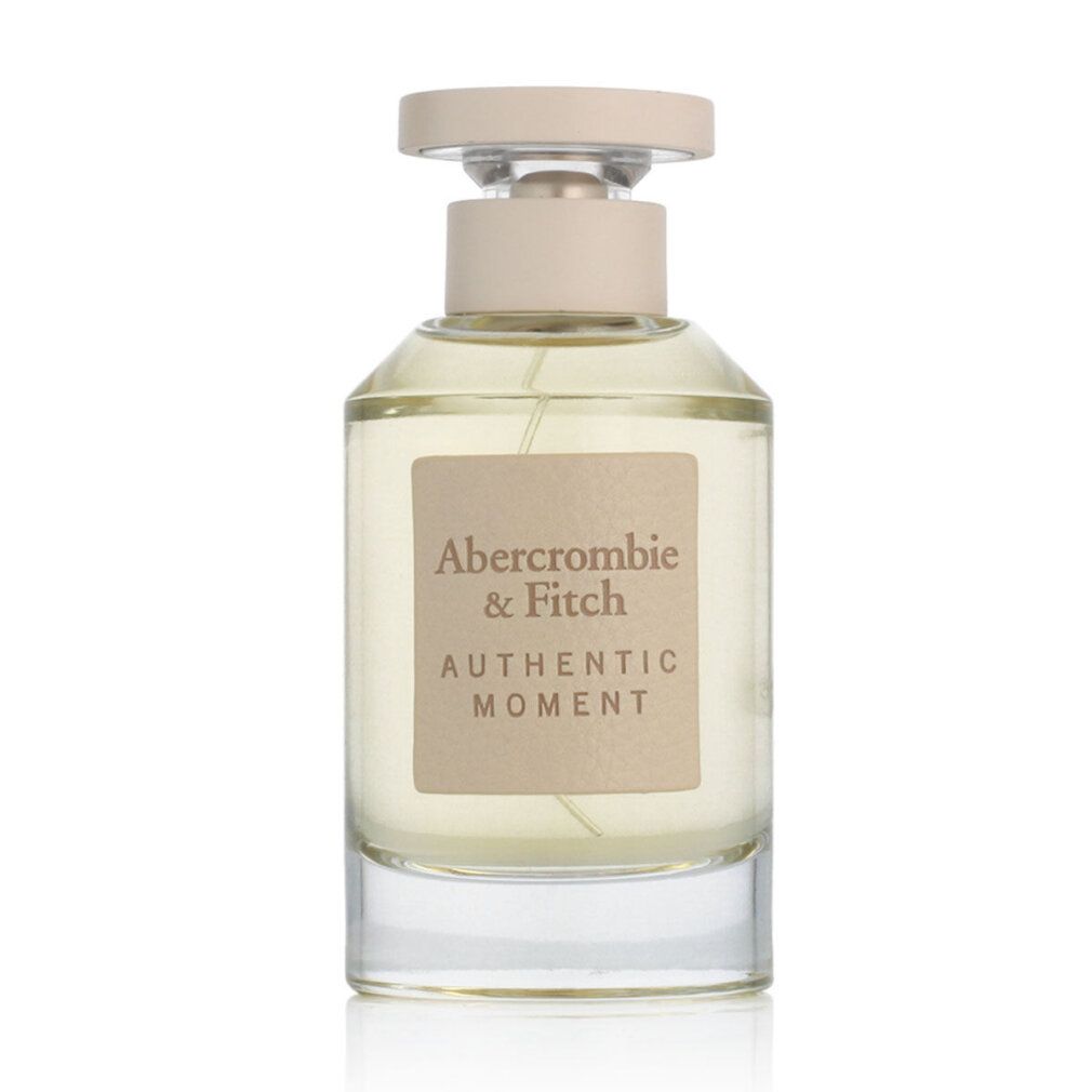 Parfümflasche. Aufschrift: Abercrombie & Fitch, Authentic Moment. Transparente Flüssigkeit.