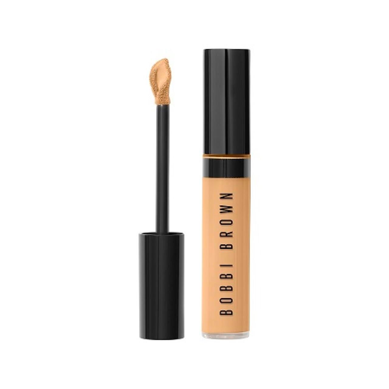 Bobbi Brown Skin Full Cover Concealer. Beige Tube mit schwarzem Deckel und Applikator. Produktname vertikal auf dem Tube.