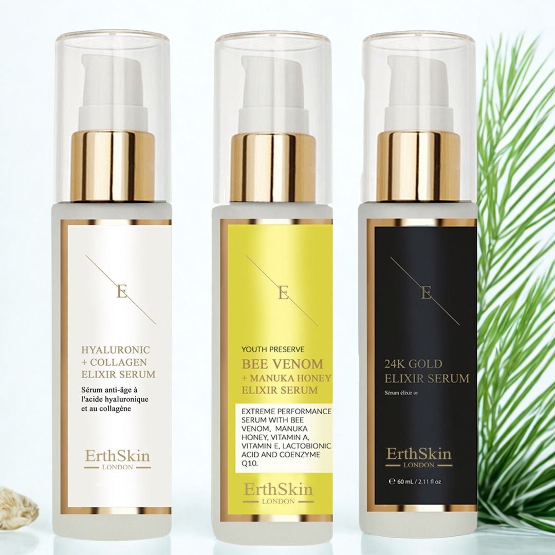 Drei Serumflaschen mit Pumpverschluss. Beschriftung: Hyaluronsäure + Kollagen, Bienenvenom + Manuka-Honig, 24K Gold. Marke: ErthSkin London.