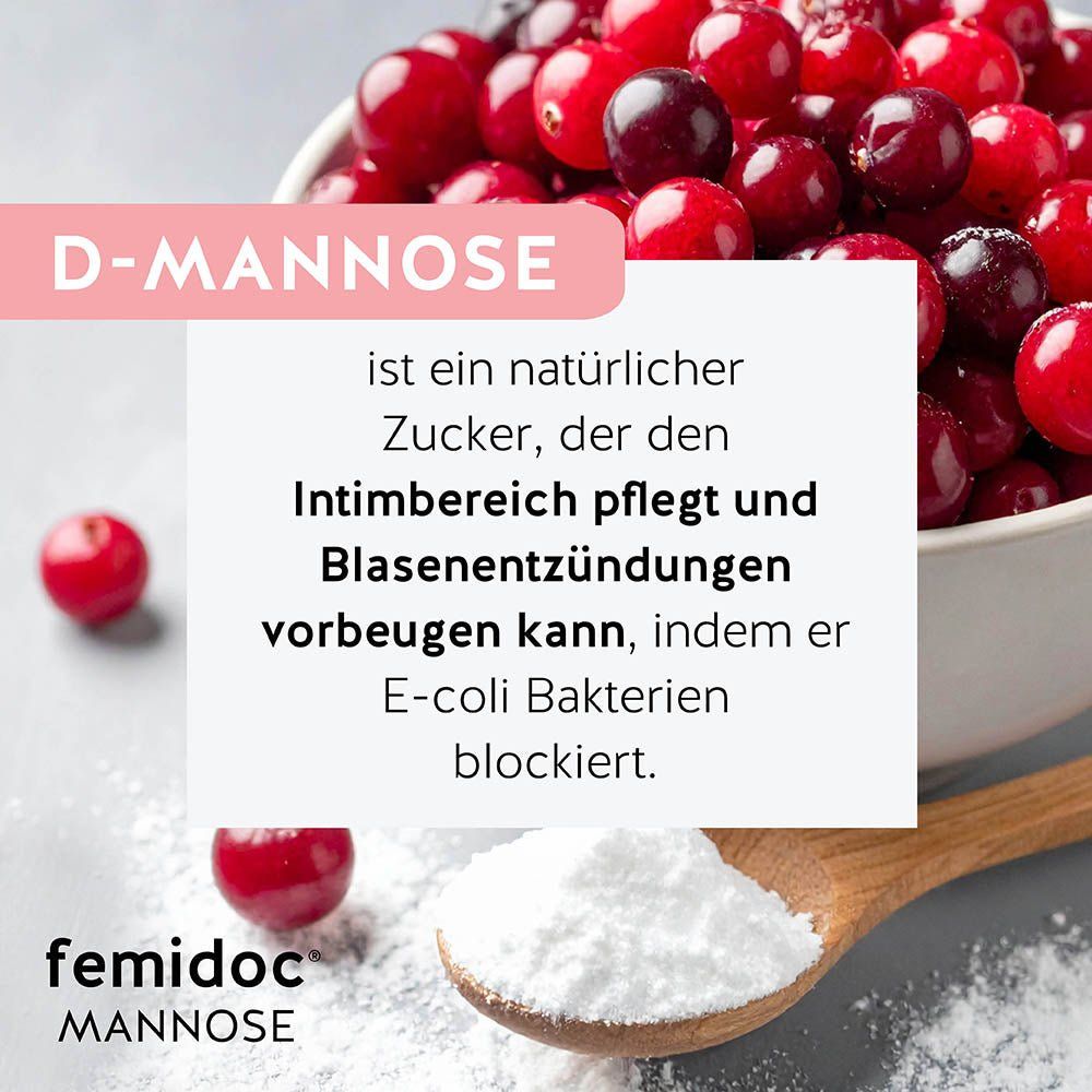 Schüssel mit Cranberries, daneben D-Mannose-Pulver. Text: D-Mannose ist ein natürlicher Zucker.