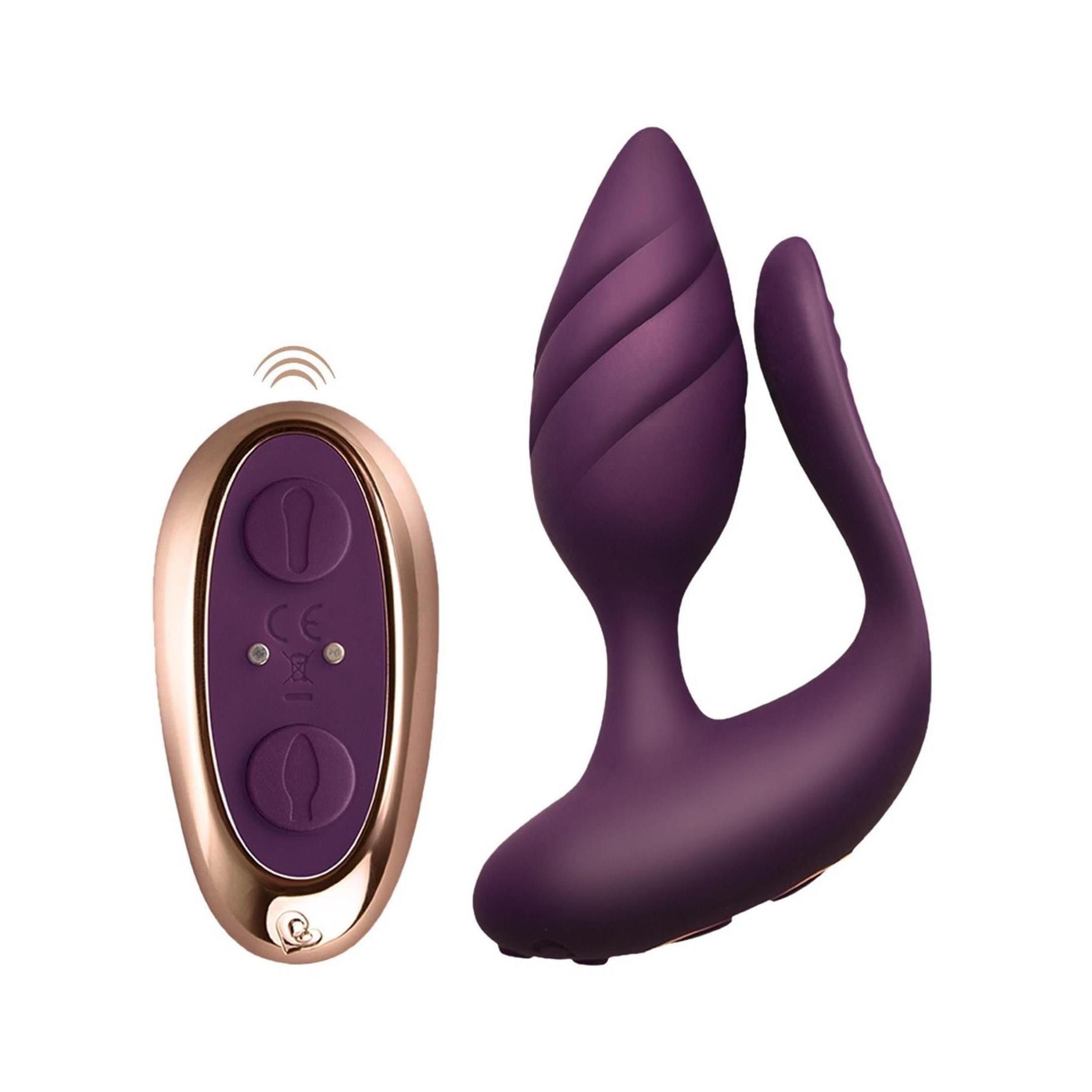 Lila Wellness-Produkt mit Fernbedienung. Fernbedienung goldfarben, Produkt mit geriffelter Spitze und geschwungener Form.