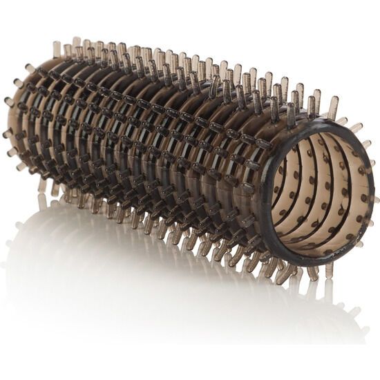 Zylindrisches Produkt mit Noppen. Dunkelbraun. Auf weißem Hintergrund.