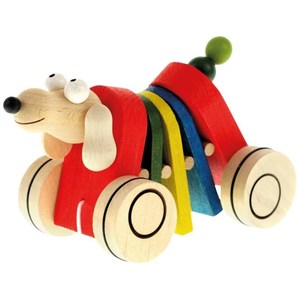 Ziehtier Hund aus Holz. Rot, gelb, blau und grüne Elemente. Augen und Nase. Räder.