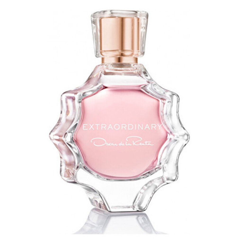 Parfümflakon mit rosa Flüssigkeit. Glasflakon mit goldfarbenem Verschluss. Schriftzug 'EXTRAORDINARY'.