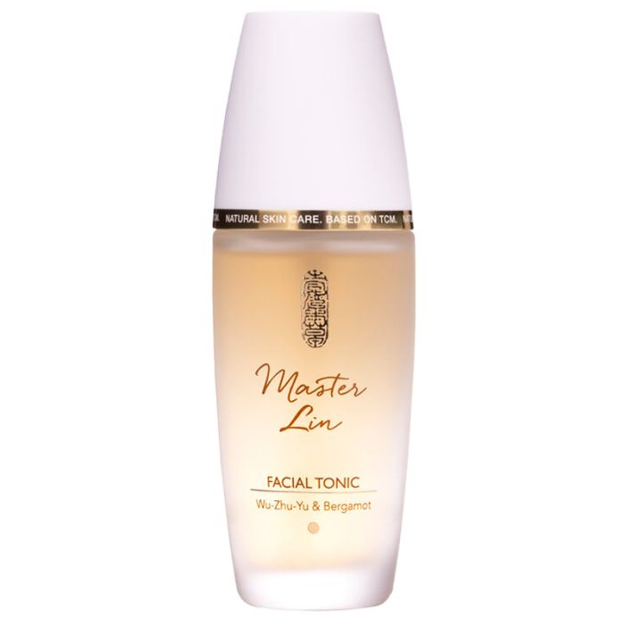 Flasche mit weißem Deckel. Aufschrift: Master Lin, Facial Tonic, Wu-Zhu-Yu & Bergamot. Goldfarbene Schrift und Verzierung.