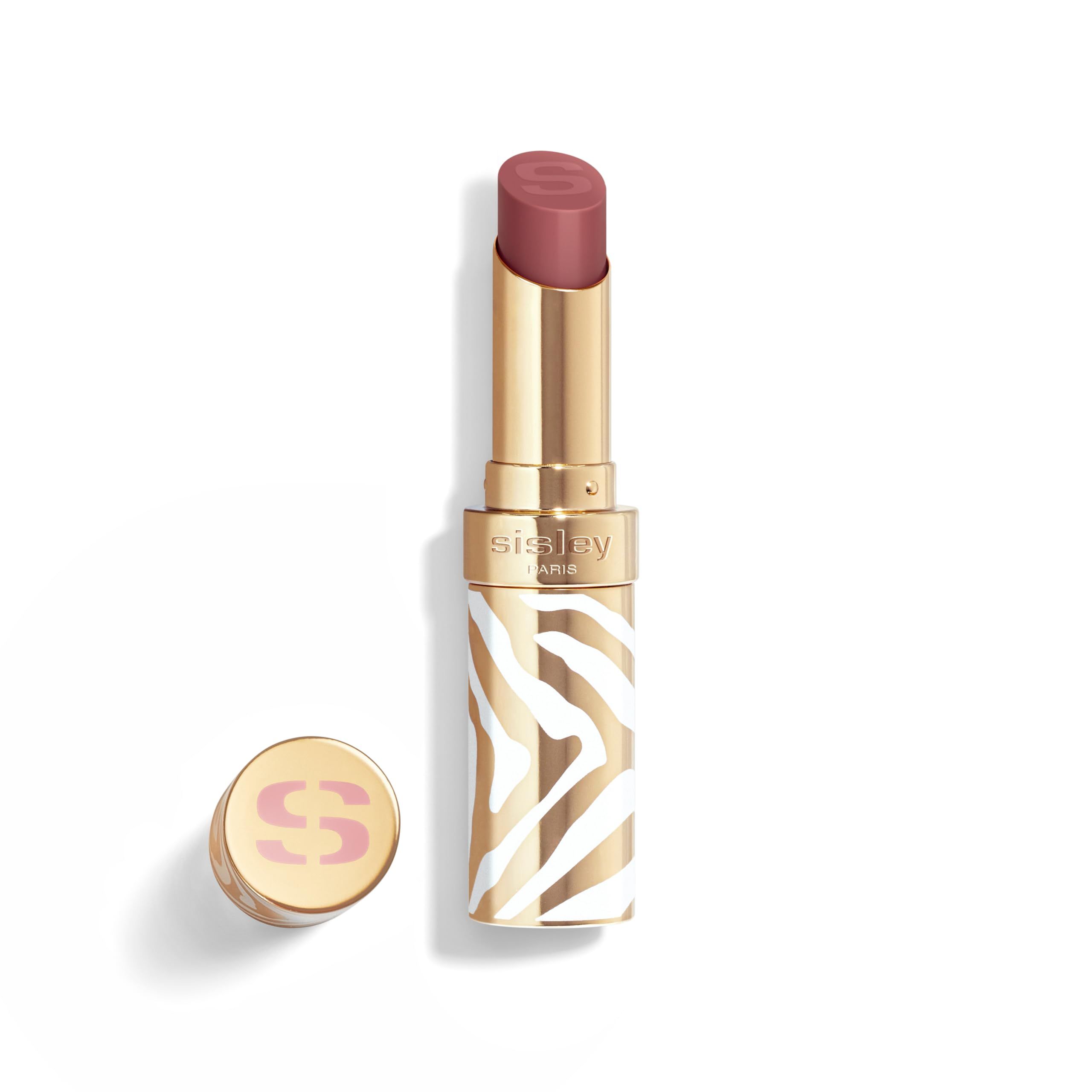 Lippenbalsam mit goldfarbenem Gehäuse und Zebra-Muster. Deckel daneben. Marke Sisley.