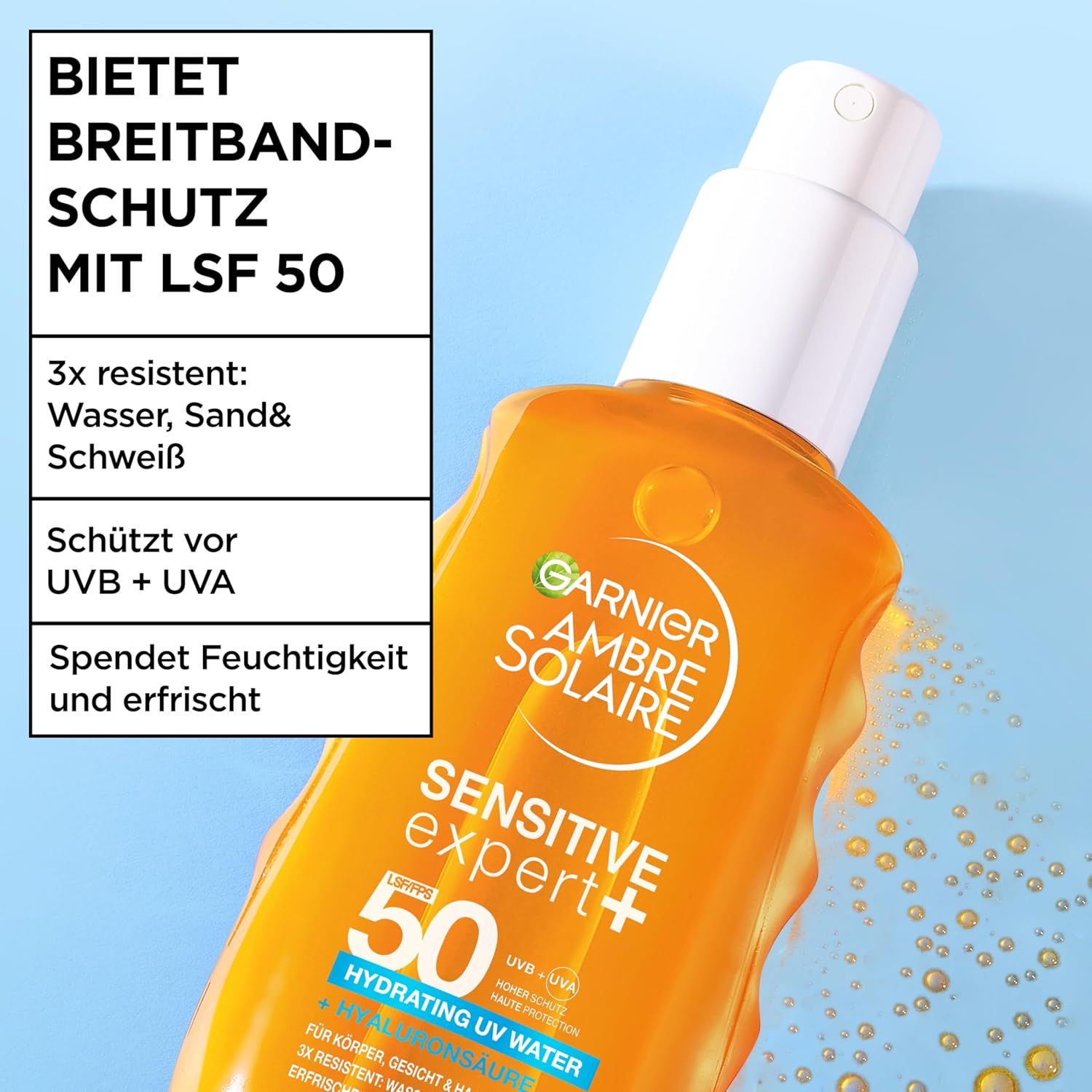 Garnier Ambre Solaire Sensitive Expert+ Sonnenspray LSF 50. Flasche vor blauem Hintergrund. Text: Bietet Breitbandschutz mit LSF 50.