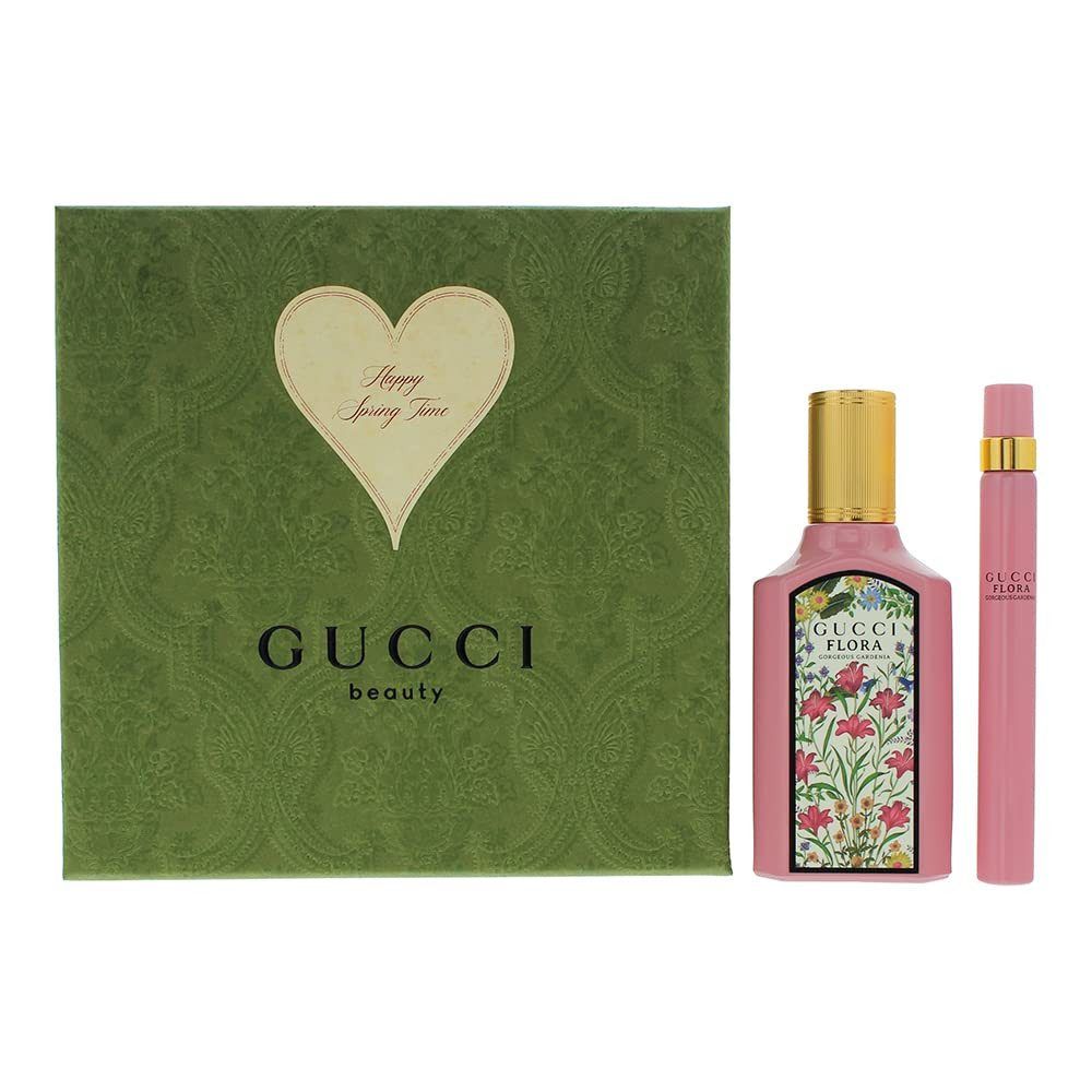 Geschenkset mit grünem Karton, Gucci-Logo und Herz. Enthält eine rosa Parfümflasche und einen Zerstäuber.