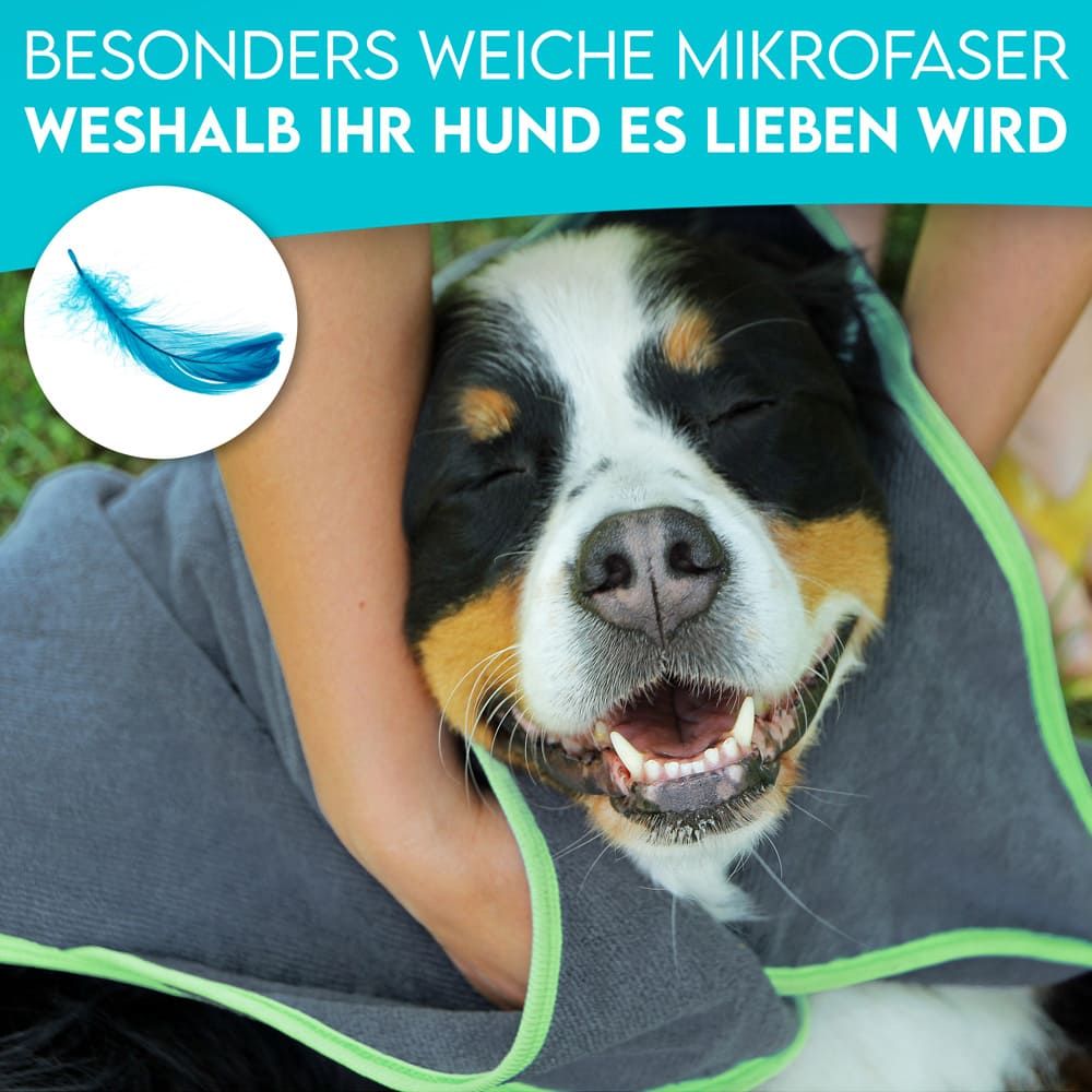 Hund wird mit Handtuch abgetrocknet. Text: Besonders weiche Mikrofaser.