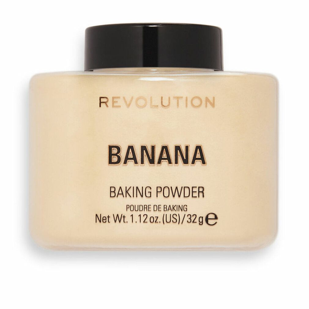 Beige Puderbehälter mit schwarzem Deckel. Aufschrift: REVOLUTION, BANANA, BAKING POWDER, Net Wt. 1.12 oz. (US)/32g e.
