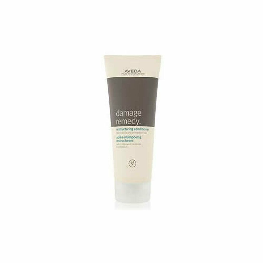 Creme-Tube mit Produktnamen und Markennamen. Text: Damage Remedy, Restructuring Conditioner. 200 ml.