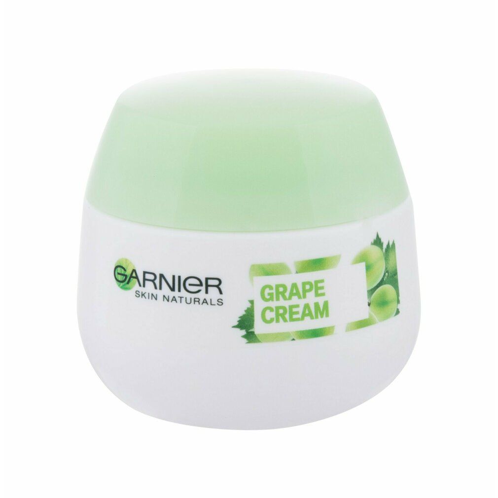 Weißer Tiegel mit grünem Deckel. Aufschrift: Garnier Skin Naturals Grape Cream. Abbildung von Trauben.