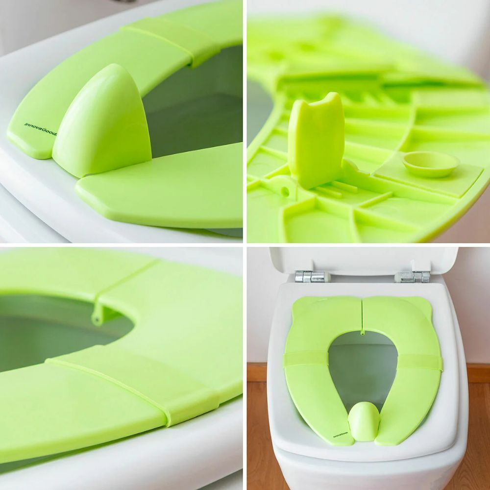 Nahaufnahmen des grünen, zusammenklappbaren Toilettensitzes für Kinder. Details der Konstruktion.