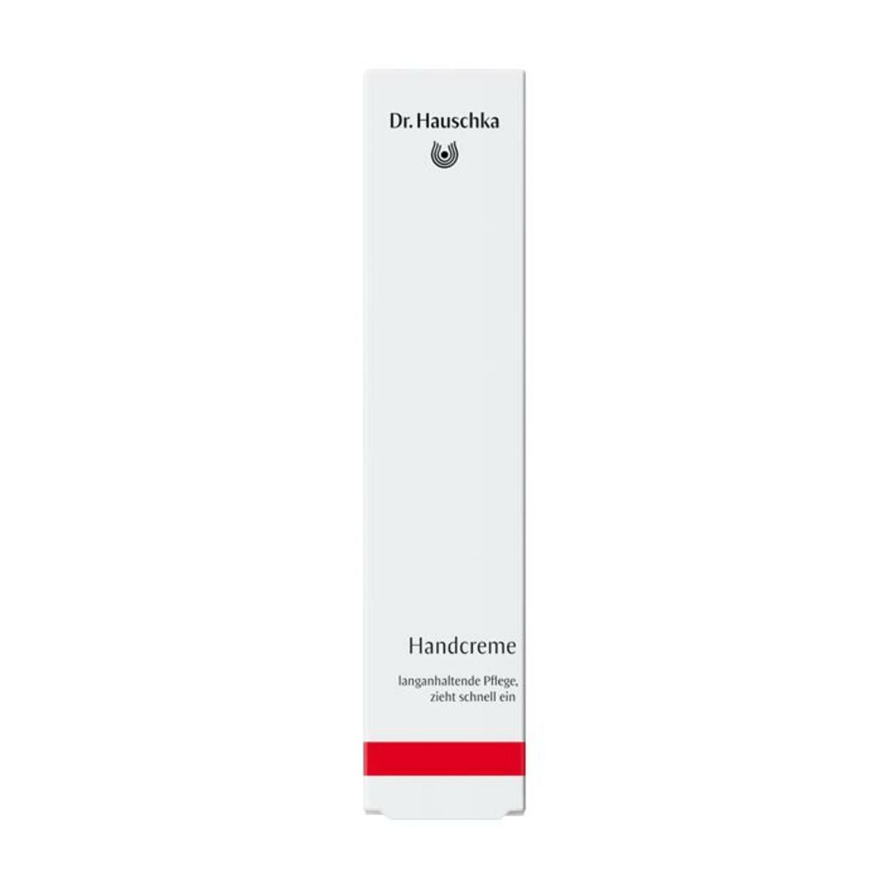 Produktverpackung. Aufschrift: Dr. Hauschka, Handcreme, zieht schnell ein.
