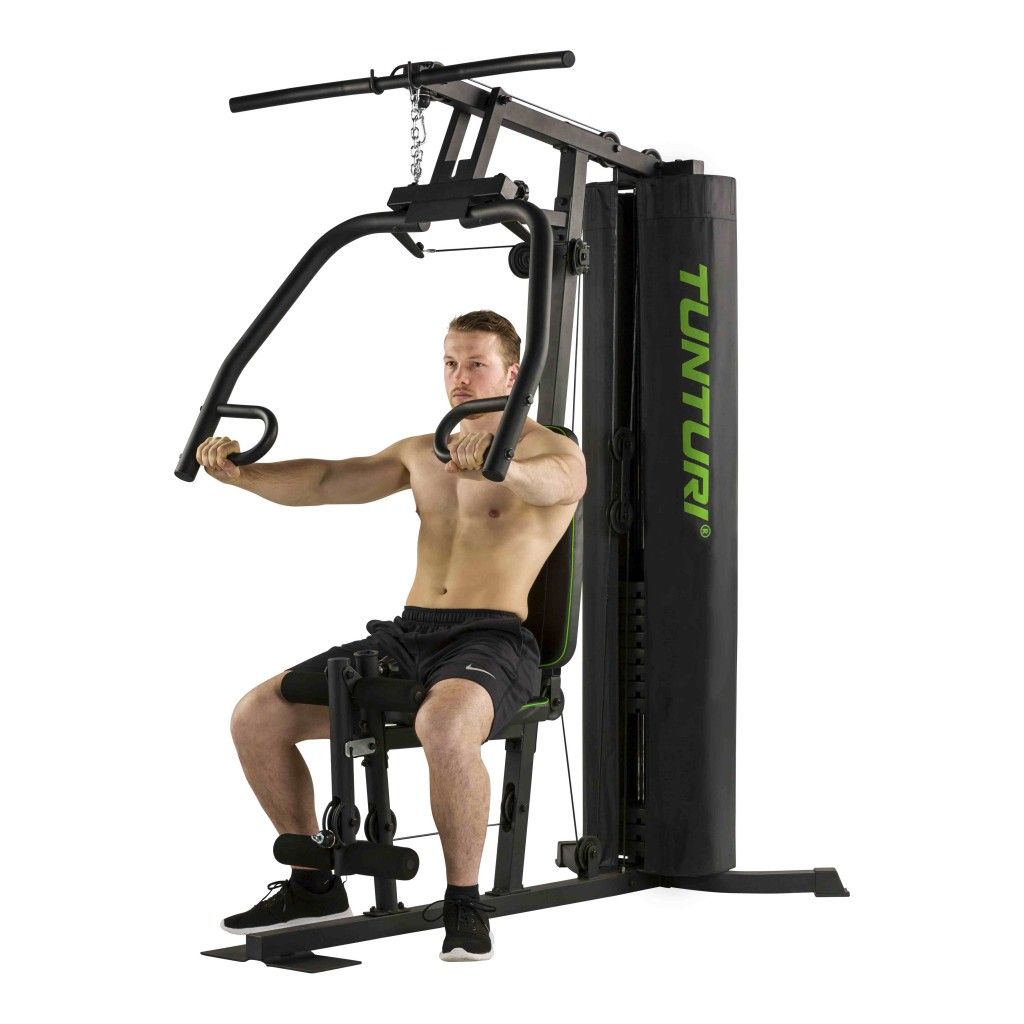 Tunturi Home Gym HG20: Mann in Sitzposition für Brusttraining.