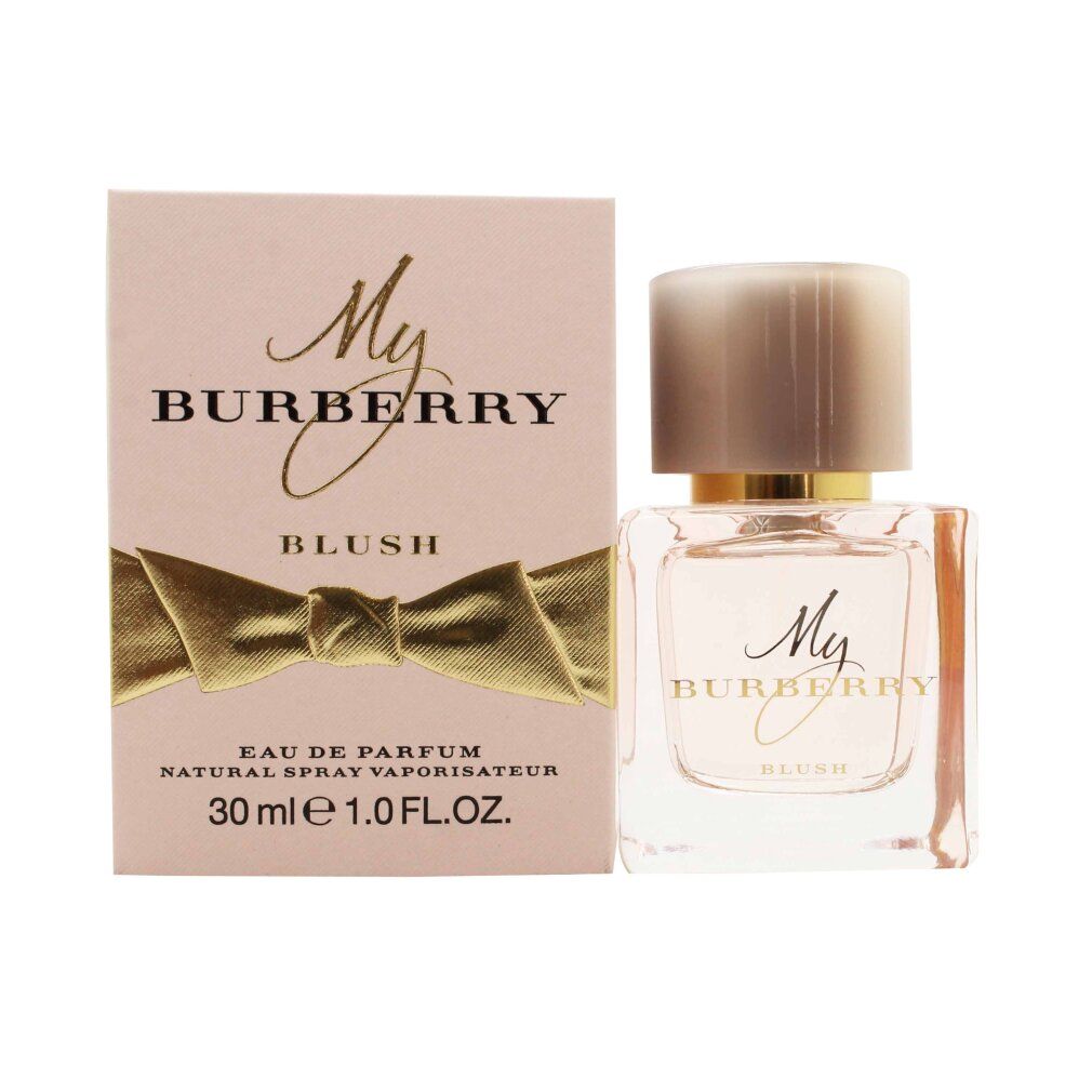 My Burberry Blush Eau de Parfum Flakon mit rosa Kappe und Schleife, neben der Verpackung.