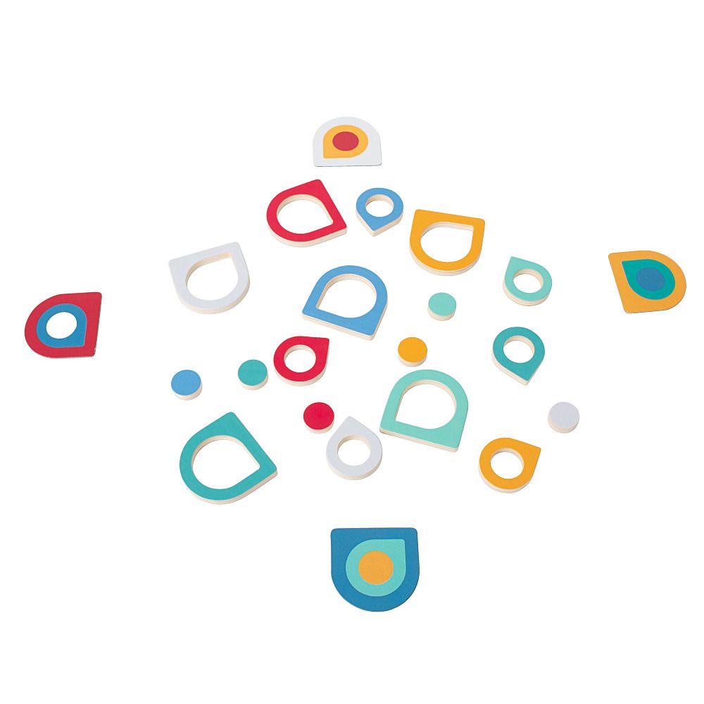 Verschiedenfarbige Formen, darunter Tropfen, Kreise und Halbkreise, liegen auf weißem Grund verstreut. Einige haben farbige Kreise.