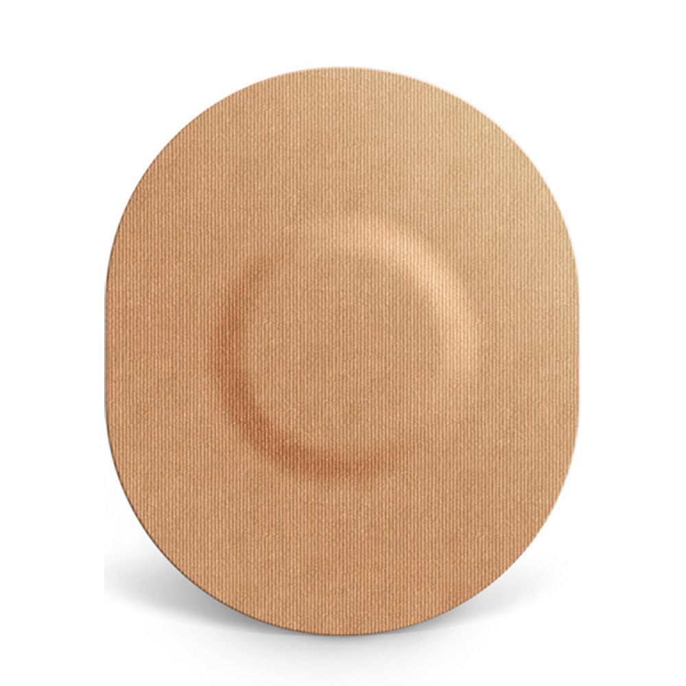 Beigefarbener, ovaler Sensorpatch mit erhabenem Mittelteil. Material mit feiner Textur.