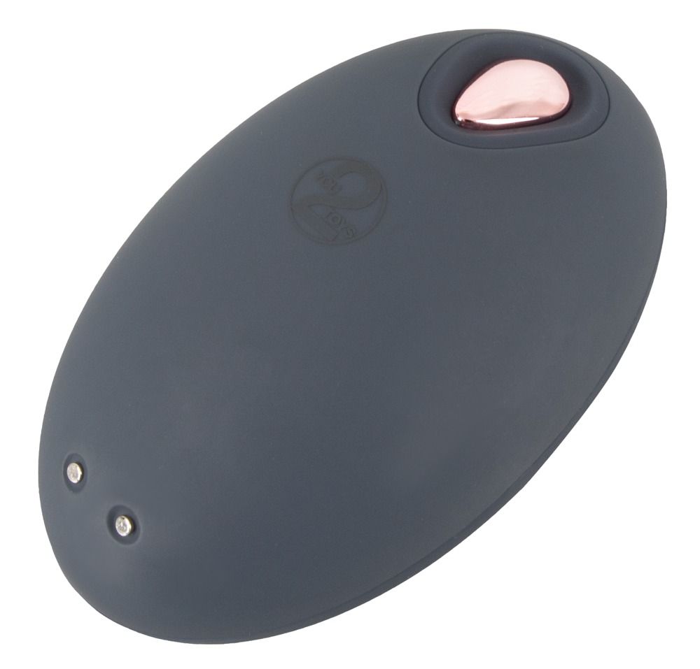 Dunkelgrauer, ovaler Vibrator mit roségoldfarbenem Akzent. Zwei kleine Punkte. Logo mit zwei Monden.