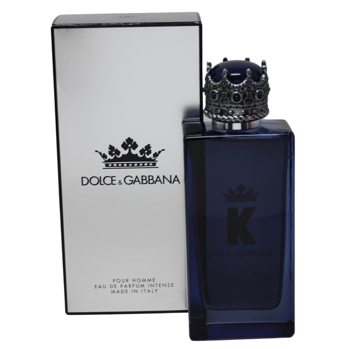 Blaue Flasche mit Kronenverschluss neben weißer Verpackung. Logo 'K' und DOLCE & GABBANA. Verpackung mit Logo und Text.
