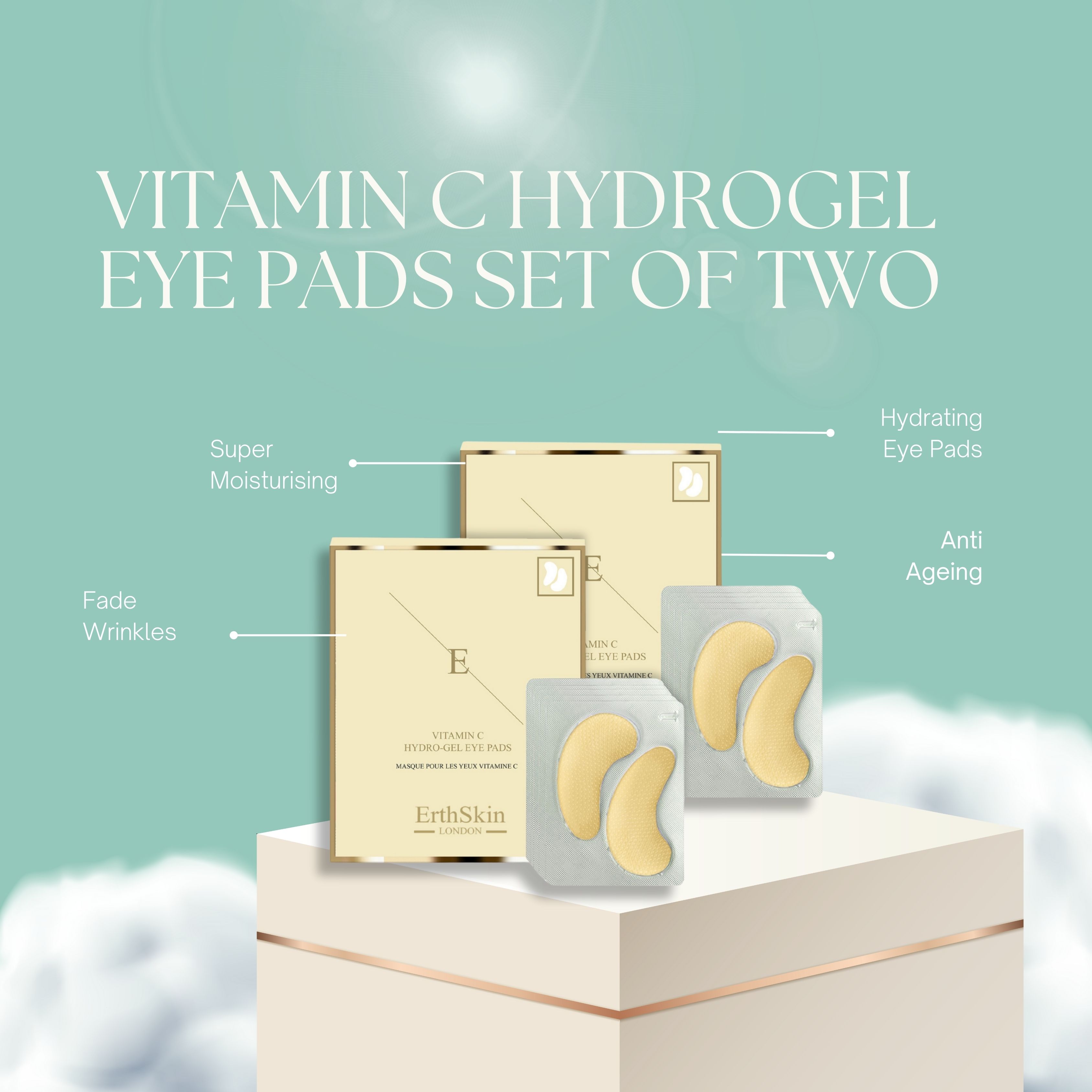 Ensemble de produits avec deux boîtes et deux blisters d'eye pads jaunes. Texte : Vitamin C Hydrogel Eye Pads Set of Two.