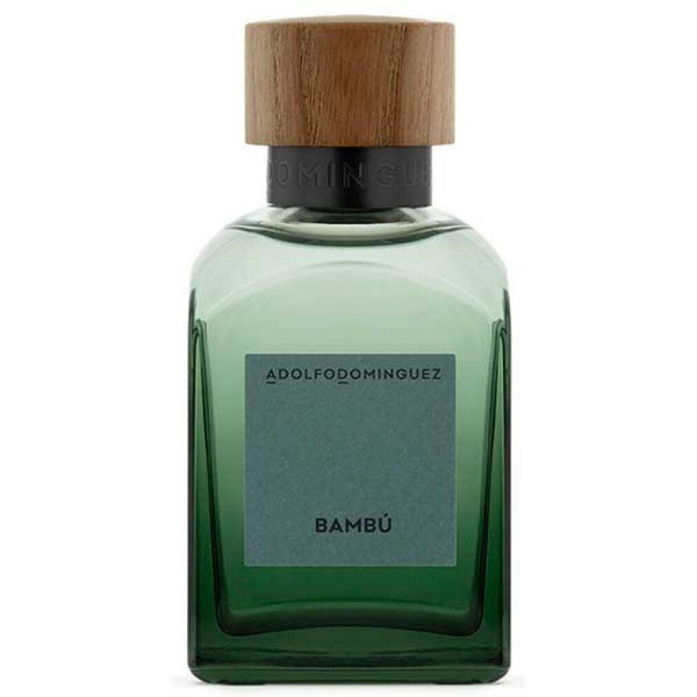 Grüne Glasflasche mit Holzdeckel. Auf dem Etikett steht "ADOLFO DOMINGUEZ BAMBÚ".