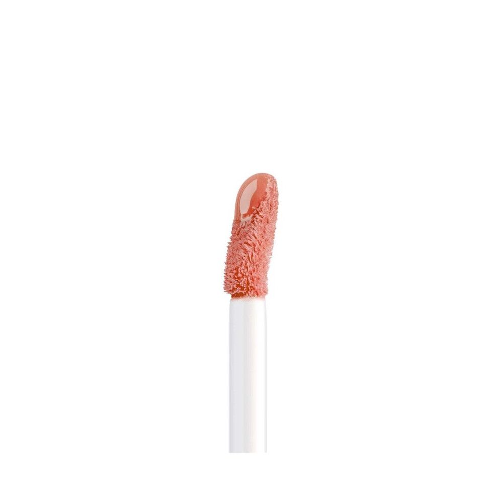 Applikator mit Artdeco Plumping Lip Fluid. Der Applikator hat eine rosa Farbe.